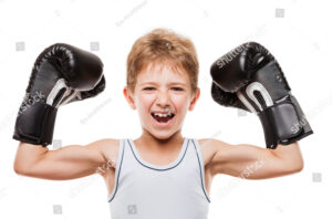 stock-photo-martial-art-sport-success-and-win-concept-smiling-boxing-champion-child-boy-gesturing-for-first-210445441